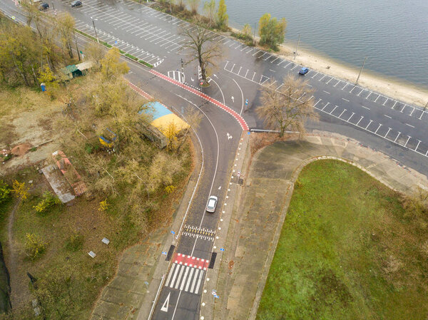 Aerial drone view. Motor road with bicycle markings.
