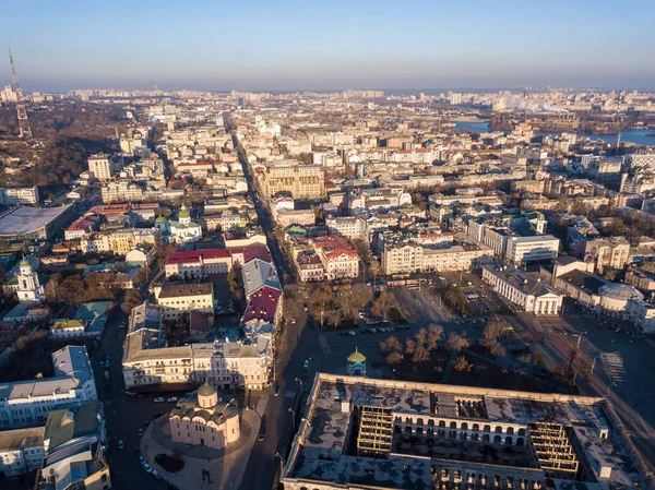 Aerial drone view. Streets of the historical center of Kiev - Podil on a sunny morning.