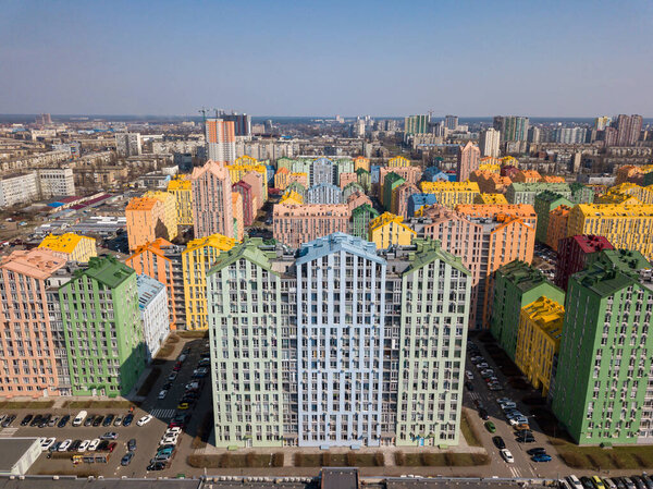Multi-colored residential buildings in Kiev in sunny weather. Aerial drone view.