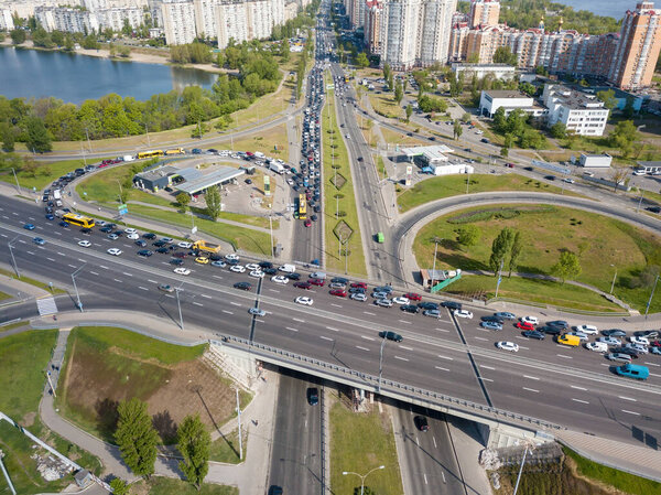 Traffic jam on the road bridge. Aerial drone view.
