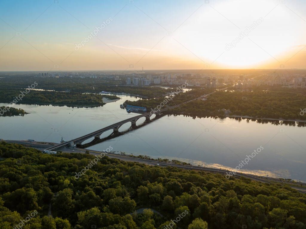 Dnieper river in Kiev at dawn. Clear morning. Aerial drone view.