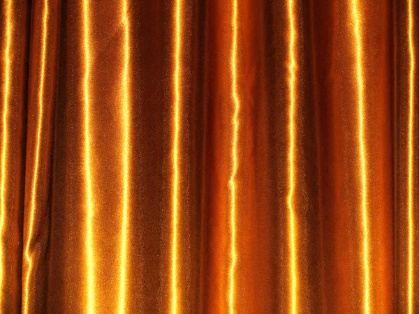 Folds of silk fabric in golden tones — Stock Photo, Image