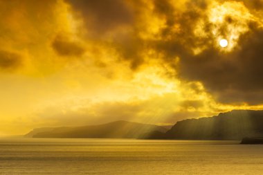 Dorset kıyısında günbatımı