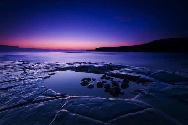 Rocky Dorset Coastline al tramonto — Foto Stock