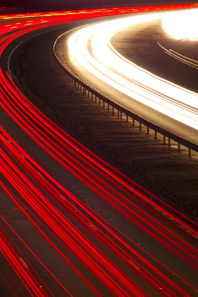Headlight and tail light trails at night — Stock Photo, Image