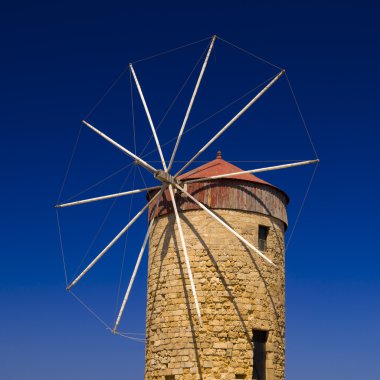 Traditional Windmill at Mandraki Harbour, Rhodes clipart