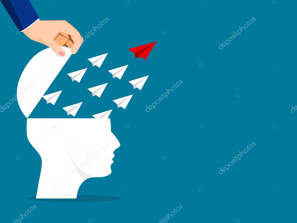 The human head was opened and the paper plane flew away. The concept of leadership and differentiation. business concept