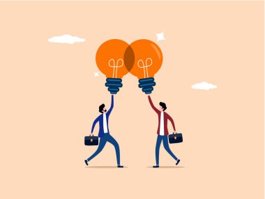 İki işadamı bilgi paylaşmak için birlikte çalışır.