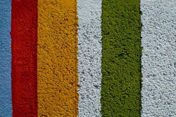 Regenbogen bunte Ziegelwand — Stockfoto