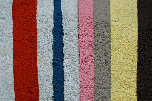 Regenboog kleurrijke bakstenen muur — Stockfoto
