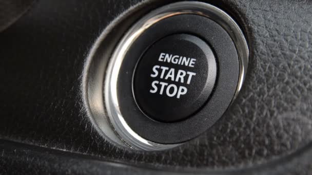 Engine start stop button from a modern car interior — Stock Video