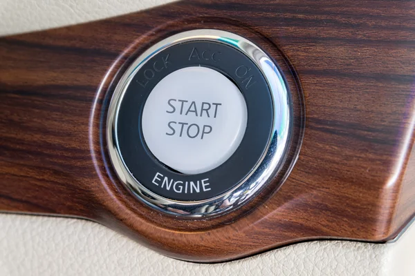 Engine start stop button from a modern car interior — Stock Photo, Image