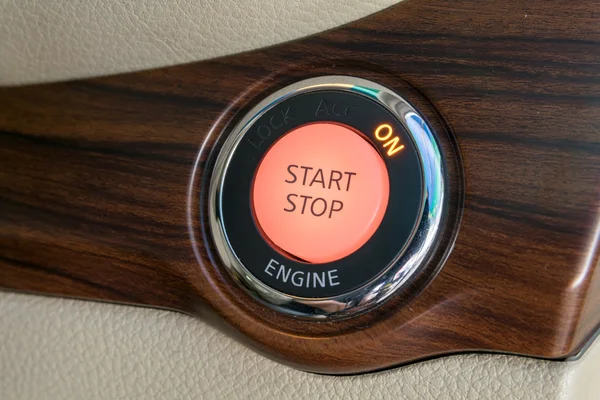 Engine start stop button from a modern car interior — Stock Photo, Image