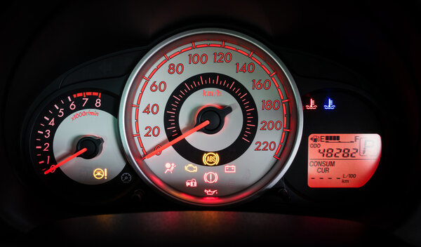 Modern car illuminated dashboard closeup