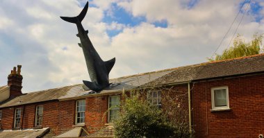 Sharknado in the real world. The Headington Shark sculpture. clipart