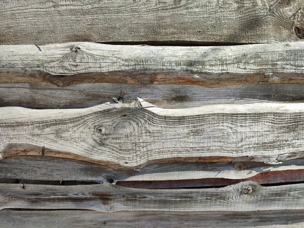 Old weathered wood barrels or planks textured background