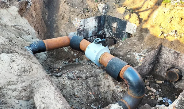 Underground large gas pipe line and valve fixed in trench