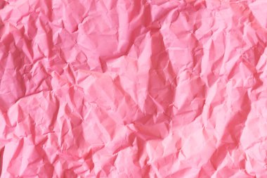 Pembe, buruşuk, buruşuk kağıt dokusu. Yaratıcı duvar kağıdı