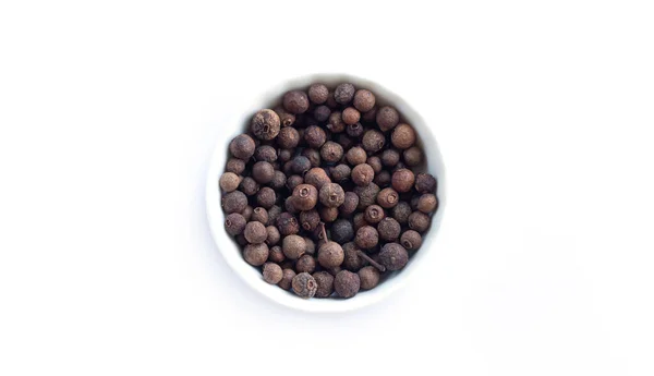 Schaal Van Allspice Geïsoleerd Witte Achtergrond Bovenaanzicht Jamaica Peper Allspice — Stockfoto