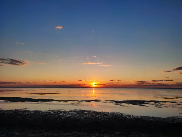 Panorama of beautiful sunrise on the sea. Wild nature background