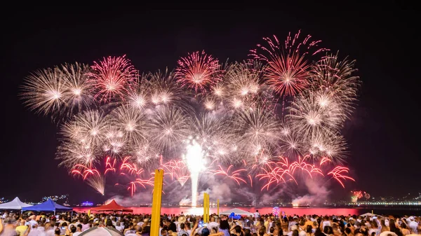 NITEROI, RIO DE JANEIRO, BRAZIL: Photos of the arrival of the New Year (Reveillon). Event with party, shows and fireworks. People flock to see the light and colors of pyrotechnic explosions on a beach.