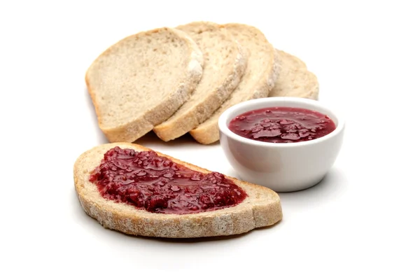 Bread and raspberry jam — Stock Photo, Image