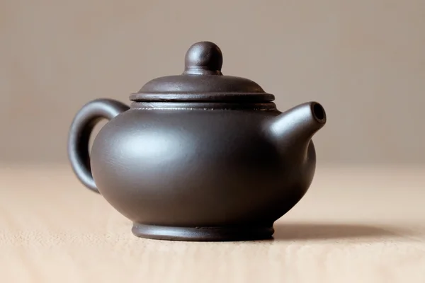 Brown ceramic teapot