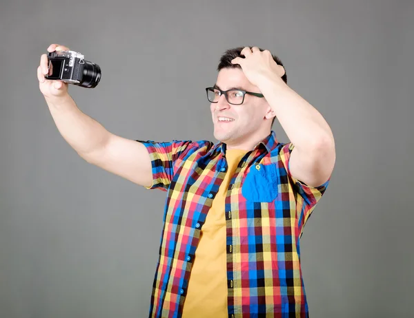 Man taking selfie isolated on gray background — Stock Photo, Image