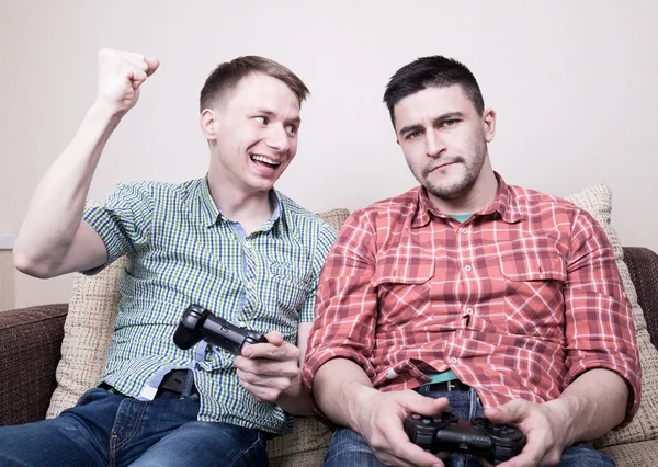 Two guys playing video games