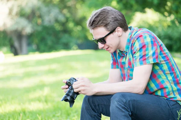 Hipster with camera — Stock Photo, Image