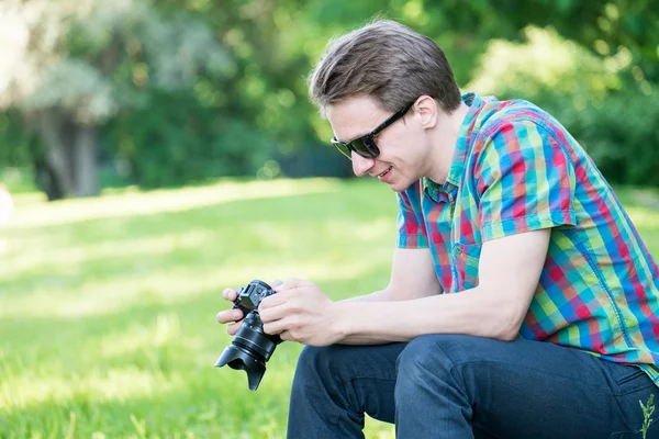 Hipster with camera — Stock Photo, Image