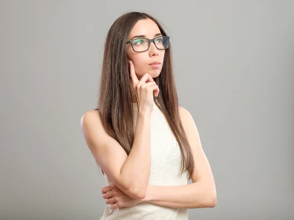 Töprengő nő szemüveg — Stock Fotó