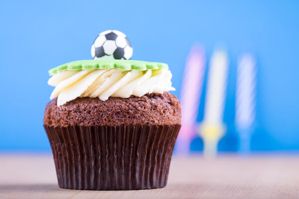 Delicious cupcake on table
