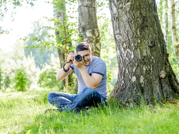 Hipster with camera — Stock Photo, Image