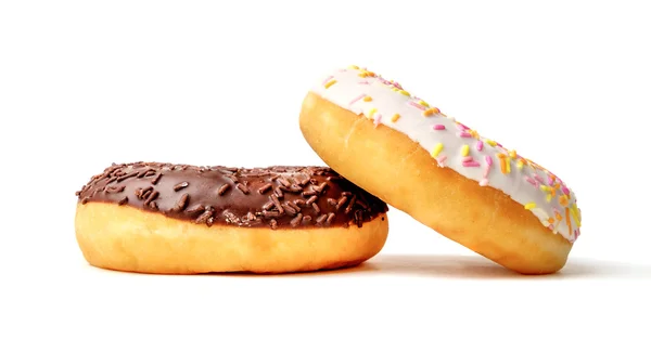 Chocolade en witte donuts — Stockfoto