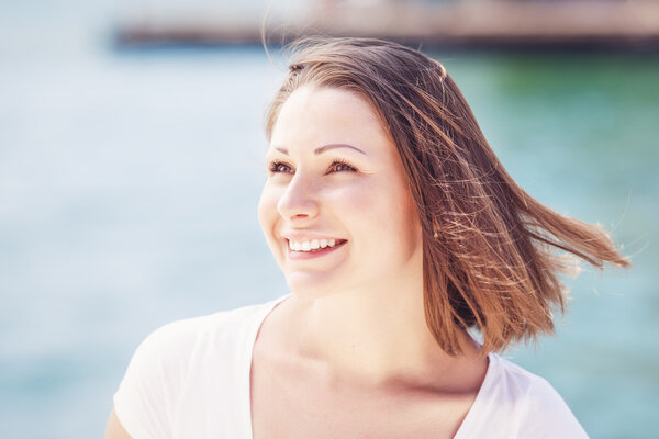 Portrait of young woman with messy hair