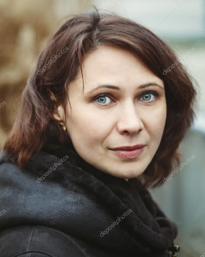 Closeup portrait of beautiful middle age white caucasian brunette woman ...