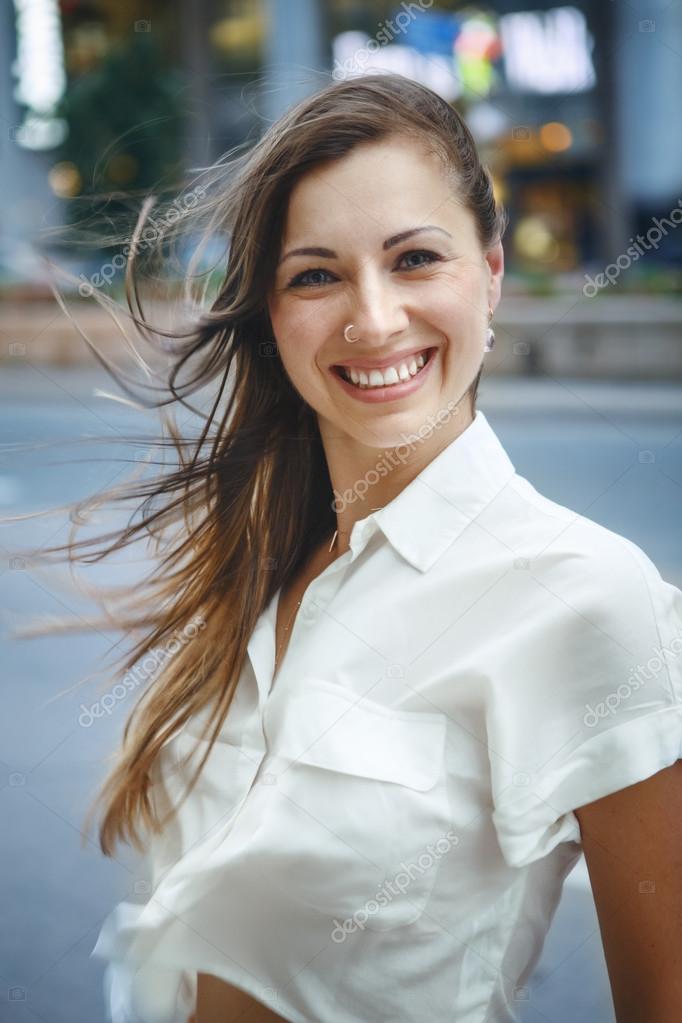 Closeup Portrait Of Young Smiling Caucasian Woman Girl With Blue