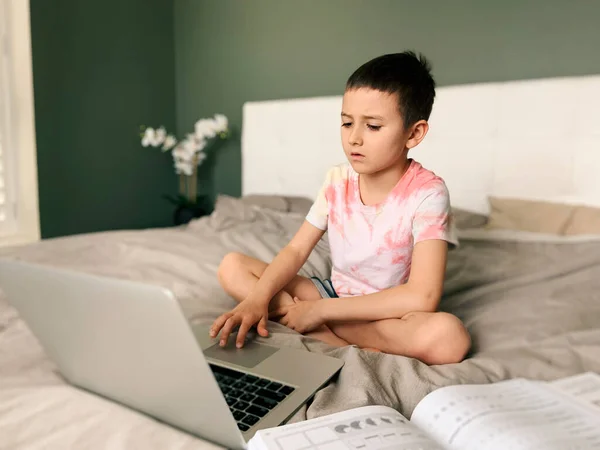 Caucasian Boy Child Sitting Bed Learning Online Laptop Internet Virtual — Stock Photo, Image