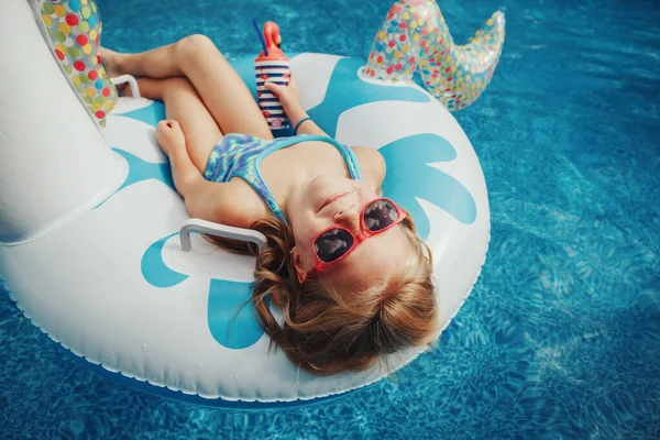 Cute Adorable Girl Sunglasses Drink Lying Inflatable Ring Unicorn Kid — Stock Photo, Image