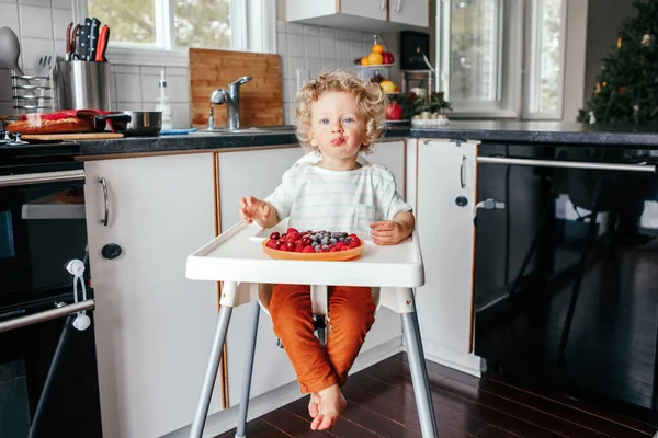 Cute Caucasian Baby Boy Eating Ripe Red Fruits Home Funny — Stock Photo, Image