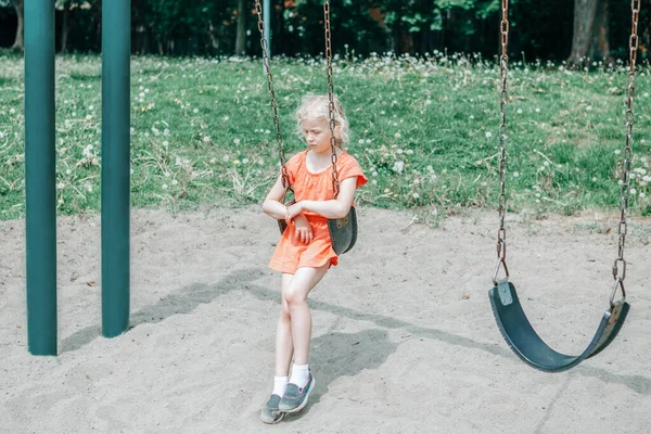 Sad Unhappy Girl Swinging Swing Set Park Outdoor Alone Upset — Stock Photo, Image