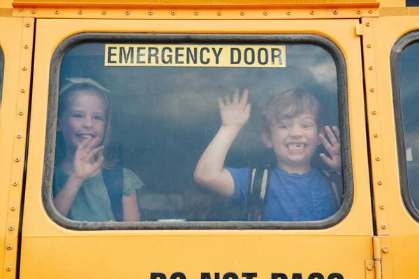 Funny Happy Smiling Boy Girl Kids Students Looking Out School — Zdjęcie stockowe