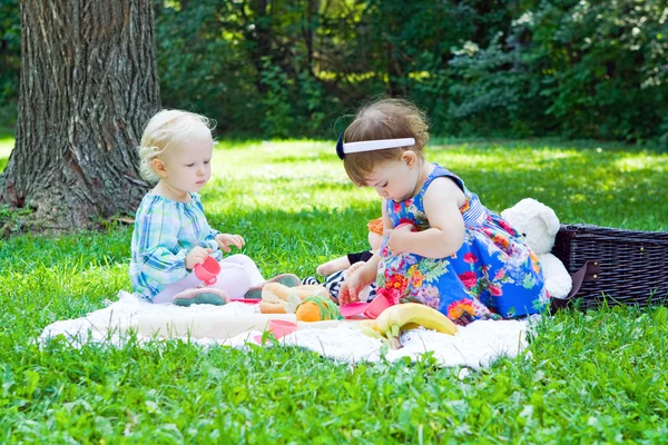 Girl friends playing in park — Stock Photo, Image