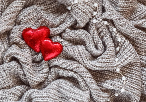 Knitted wool, red heart, pearl, valentine — Stock Photo, Image