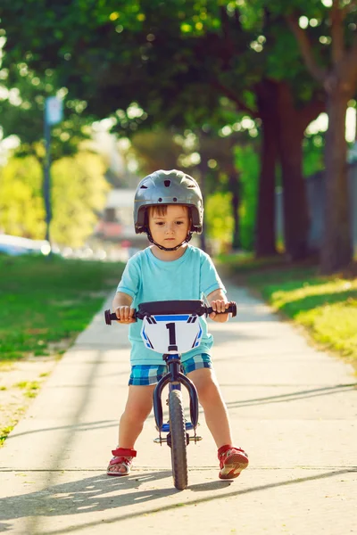 Boy riding a bicycle