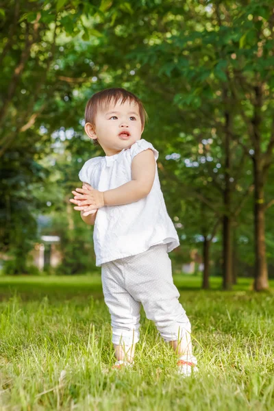 Portrait of cute Asian child clapping her hands — 图库照片