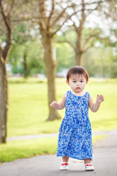 Portrait of cute Asian child playing in park — Stock Photo, Image