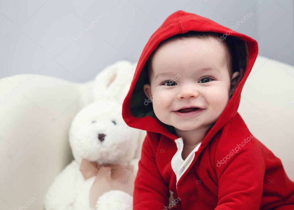 Cute Caucasian baby boy girl black eyes