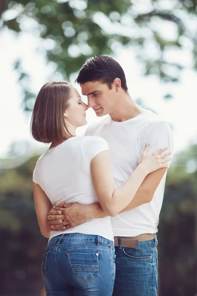 Portrait of young couple man woman girl — Stock Photo, Image